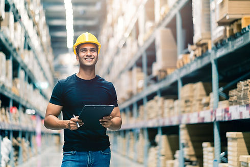 smart-indian-engineer-man-wearing-safety-helmet-doing-stock-tick-check-cardboard-stock-pro